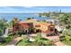 Beautiful Mediterranean home overlooking bay views with a lush circular driveway and garden at 501 Brightwaters Ne Blvd, St Petersburg, FL 33704