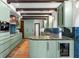 Spacious kitchen featuring custom cabinetry, marble countertops, and top-of-the-line appliances at 501 Brightwaters Ne Blvd, St Petersburg, FL 33704