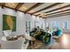 Well-lit living room boasts stylish decor, water views, and a patterned ceiling, offering a comfortable space at 501 Brightwaters Ne Blvd, St Petersburg, FL 33704
