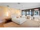 Main bedroom features unique light fixtures and water views at 501 Brightwaters Ne Blvd, St Petersburg, FL 33704
