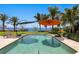 A private pool featuring chaise lounges and umbrellas, and views of the bay at 501 Brightwaters Ne Blvd, St Petersburg, FL 33704