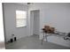 Bedroom showcasing tile flooring and closet space, suitable for storage and organization at 5581 Greyston St, Palm Harbor, FL 34685