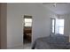 Main bedroom featuring walk-in closet and ensuite bathroom at 5581 Greyston St, Palm Harbor, FL 34685