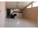 Bright living room with high ceilings, an open floorplan, and a cozy fireplace at 5581 Greyston St, Palm Harbor, FL 34685