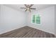 Bright bedroom featuring a ceiling fan, neutral walls, and a window for natural light at 575 53Rd N Ave, St Petersburg, FL 33703