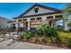 Community clubhouse with covered seating and beautifully landscaped grounds for residents at 575 53Rd N Ave, St Petersburg, FL 33703
