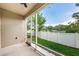 Screened patio with view of the fenced backyard and lush landscaping at 575 53Rd N Ave, St Petersburg, FL 33703