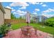 Patio with an outdoor table and chairs, great for relaxation and entertaining at 5806 Tulip Flower Dr, Riverview, FL 33578