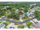 This aerial view showcases the property within a suburban neighborhood, complete with lush greenery and well-maintained streets at 6204 Walsh Ln, Tampa, FL 33625