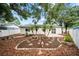 Lush backyard showcasing tropical landscaping, a manicured garden, and a peaceful outdoor retreat at 6204 Walsh Ln, Tampa, FL 33625