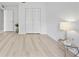Bright bedroom featuring large closet and hardwood floors at 6204 Walsh Ln, Tampa, FL 33625