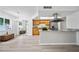 Bright, open kitchen featuring granite countertops and stainless steel appliances at 6204 Walsh Ln, Tampa, FL 33625