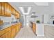 Modern kitchen with stainless steel appliances, stone countertops, and ample cabinet space at 6204 Walsh Ln, Tampa, FL 33625