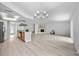 Bright open-concept living space with eat in kitchen, stone fireplace and lots of natural light at 6204 Walsh Ln, Tampa, FL 33625