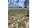 Spacious backyard enclosed with a white vinyl fence and plenty of room for activities at 7056 Landover Blvd, Spring Hill, FL 34608