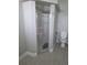 Bright bathroom featuring a shower with glass door and tile flooring at 7056 Landover Blvd, Spring Hill, FL 34608