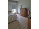 Bedroom featuring wood floors and natural lighting at 7056 Landover Blvd, Spring Hill, FL 34608