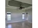 Open living area with abundant natural light and decorative ceiling detail at 7056 Landover Blvd, Spring Hill, FL 34608