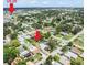 An aerial view of the property's location, surrounded by lush greenery and neighborhood homes at 8233 44Th St N N St, Pinellas Park, FL 33781