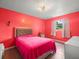 This cozy bedroom features a decorative nameplate and natural light at 8233 44Th St N N St, Pinellas Park, FL 33781