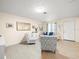 Inviting living room with wood-look floors and neutral walls at 8233 44Th St N N St, Pinellas Park, FL 33781