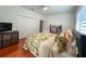 This bedroom is fully furnished and provides lots of natural light at 10675 Park Place Dr, Largo, FL 33778