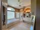 Spacious bathroom with a soaking tub and a glass-enclosed shower at 10675 Park Place Dr, Largo, FL 33778