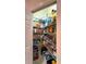 Walk-in pantry offers generous shelving for organized food and supply storage at 10675 Park Place Dr, Largo, FL 33778