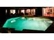 Inviting pool with shimmering water, offering a refreshing oasis for relaxation and recreation at 10675 Park Place Dr, Largo, FL 33778