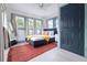 Cozy bedroom featuring a comfy bed, soft textures, and lots of natural light at 112 E Plymouth St, Tampa, FL 33603