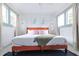 Inviting bedroom featuring a comfortable bed, modern accents, and plenty of natural light at 112 E Plymouth St, Tampa, FL 33603