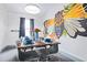 Inviting dining room with a vibrant mural and seating for eight at 112 E Plymouth St, Tampa, FL 33603
