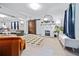 Cozy living space featuring modern furniture, fireplace, and open layout with connecting living spaces at 112 E Plymouth St, Tampa, FL 33603