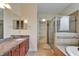 Bathroom with large shower, walk-in closet and double vanity at 11911 Sunburst Marble Rd, Riverview, FL 33579