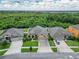 A beautiful single-Gathering home featuring a well-manicured lawn and an attached two-car garage at 11911 Sunburst Marble Rd, Riverview, FL 33579
