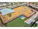 Community playground area with swings, slides, and a covered picnic space at 11911 Sunburst Marble Rd, Riverview, FL 33579