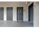 Apartment entryway featuring unit doors, stairway access, and outdoor welcome mat at 12912 Arbor Isle Dr # 202, Temple Terrace, FL 33637