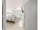 This is a bright main bedroom with lots of natural light and clean white decor at 12912 Arbor Isle Dr # 202, Temple Terrace, FL 33637