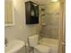 Cozy bathroom with tub, vanity, and tiled walls at 1301 S Howard Ave # C4, Tampa, FL 33606