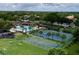 Community amenities including a pool, sports courts, and playground enhance the living experience at 1319 Dew Bloom Rd, Valrico, FL 33594