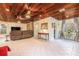 Spacious living room with wood ceilings, tiled floors and a comfortable seating arrangement at 1533 Suffolk N St, St Petersburg, FL 33710