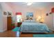 Spacious bedroom with coastal decor, featuring hardwood floors at 2019 Gardenia Landings Lane Ln, Sun City Center, FL 33573
