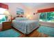 Comfortable bedroom features hardwood floors, and plenty of natural light at 2019 Gardenia Landings Lane Ln, Sun City Center, FL 33573