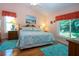 Bright bedroom with hardwood floors and a large window at 2019 Gardenia Landings Lane Ln, Sun City Center, FL 33573