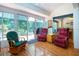 Inviting living area leads to a screened patio at 2019 Gardenia Landings Lane Ln, Sun City Center, FL 33573