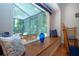 Charming window seat with view to screened lanai at 2019 Gardenia Landings Lane Ln, Sun City Center, FL 33573