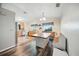 Open dining area with wood-look flooring, built-in bench seating, and abundant natural light at 22422 Stillwood Dr, Land O Lakes, FL 34639