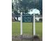 Laird Park at East Lake with playground and lake views through a chain-link fence at 22422 Stillwood Dr, Land O Lakes, FL 34639