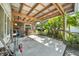 Covered patio with ample room for entertaining and a built in grill at 22422 Stillwood Dr, Land O Lakes, FL 34639
