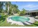 Inviting backyard pool with a large deck area, perfect for outdoor entertaining and relaxation at 22422 Stillwood Dr, Land O Lakes, FL 34639